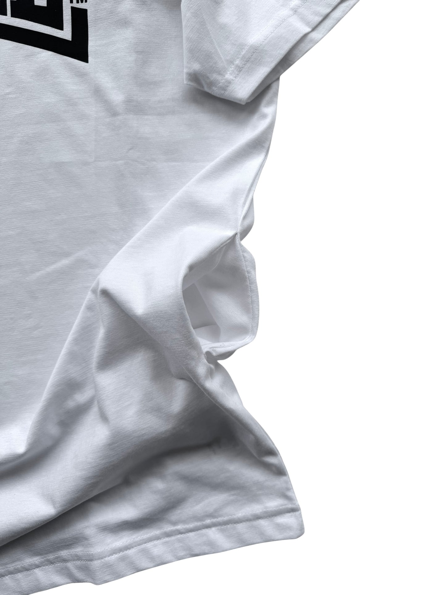 BACKLESS TEE